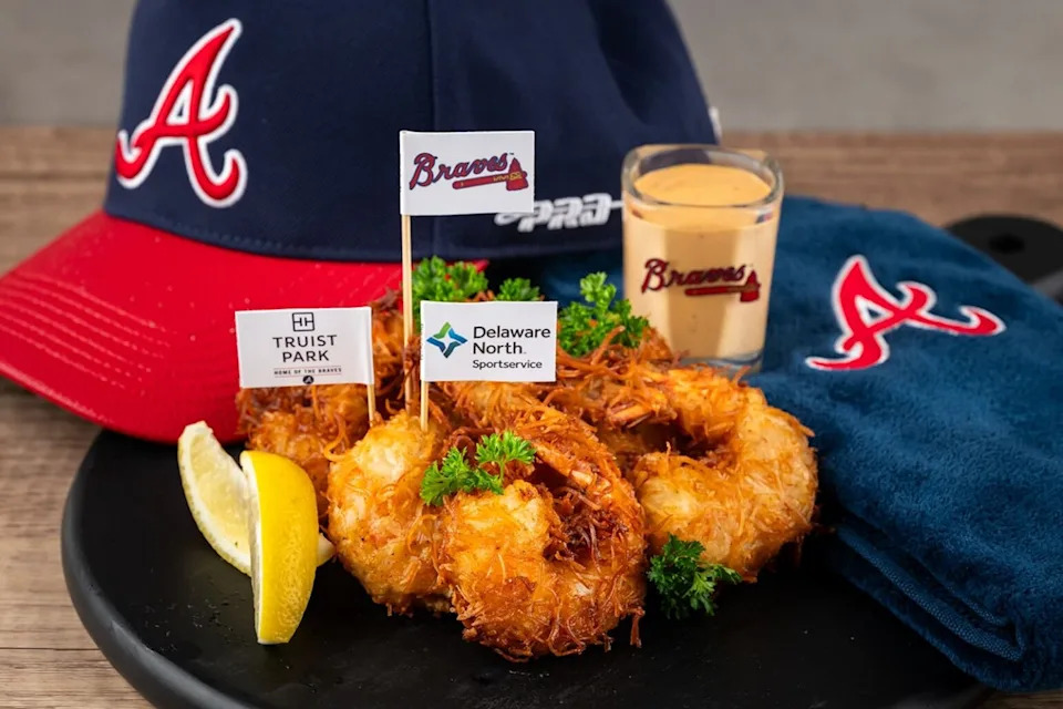 Low Country Crunch (Section 113, 1871 Grill): Six Jumbo shrimp coated in crispy coconut breading and fried golden. Served with chili aioli and a lemon wedge.