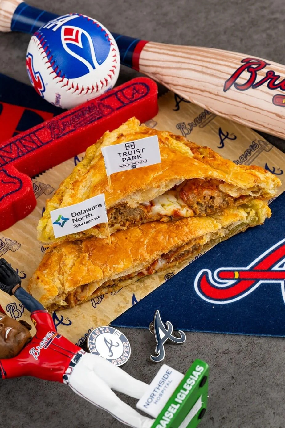 The Walk-Off (Blue Moon Beer Garden): Flaky, buttery puff pastry filled with marinara-braised meatballs and melted mozzarella – baked to a golden finish.