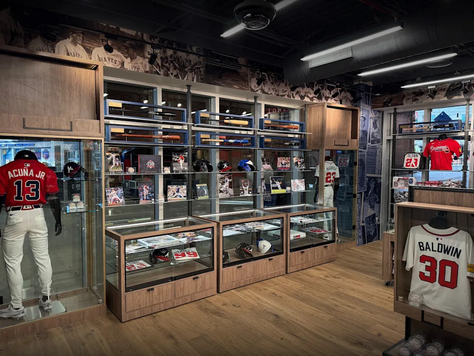 South End Trading Company, located inside the Right Field Gate at Truist Park, is a new store where Braves fans can connect with their heroes on the diamond and commemorate the shared experience of a day at the ballpark with family and friends. Fans can find a mix of unique collectibles from current and former Braves greats, exclusive game-used memorabilia, and one-of-a-kind mementos fans.