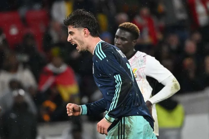 Germany's Kai Havertz celebrates scoring his side's first goal during the International Friendly soccer match between Germany and Ghana at MHP Arena. Marijan Murat/dpa