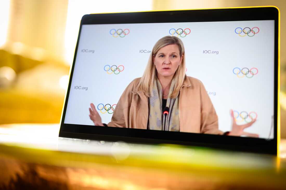IOC President Kirsty Coventry is shown on a computer screen as she speaks at a live-streamed press briefing Thursday from Lausanne, Switzerland, about the ban on transgender athletes in women's events.