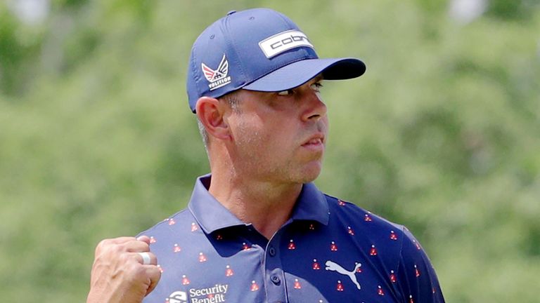 Gary Woodland pumps his fist after sinking a birdie putt on the ninth hole during the final round of the Texas Children's Houston Open 