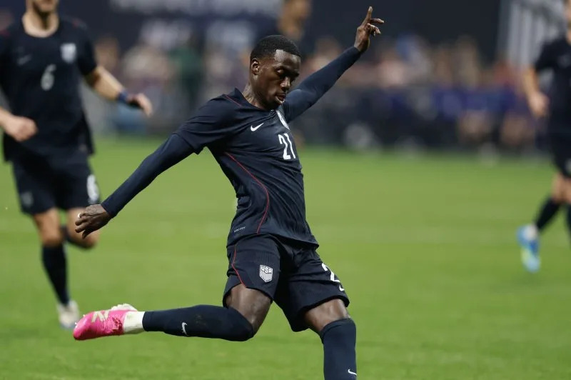 Forward Tim Weah takes a shot for the United States Men's National Team during an international friendly against Portugal on Tuesday at Mercedes-Benz Stadium in Atlanta. Photo by Mike Zarrilli/UPI