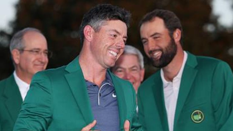 Rory McIlroy celebrates winning The Masters.in 2025, with the Northern Irishman given his green jacket by Scottie Scheffler