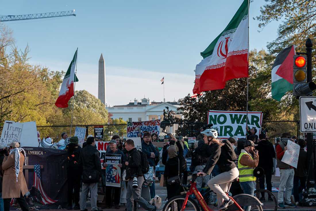 Protesters in opposition to the war with Iran gather outside of Lafayette Park across from the White House on April 7, 2026 in Washington, DC.