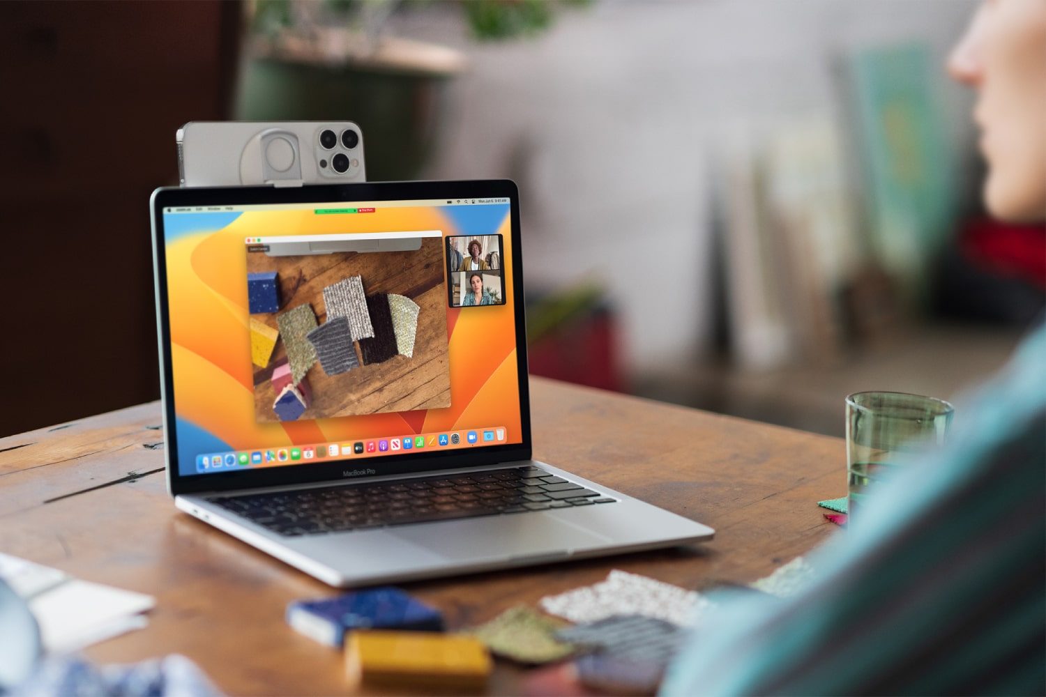 An iphone being used on a MacBook as a webcam thanks to Apple's Continuity Camera feature in macOS Ventura.