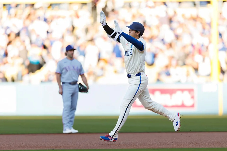 Shohei Ohtani #17 of the Los Angeles Dodgers celebrates his home run during the game against the Texas Rangers at Dodger Stadium on April 11, 2026 in Los Angeles, California. 