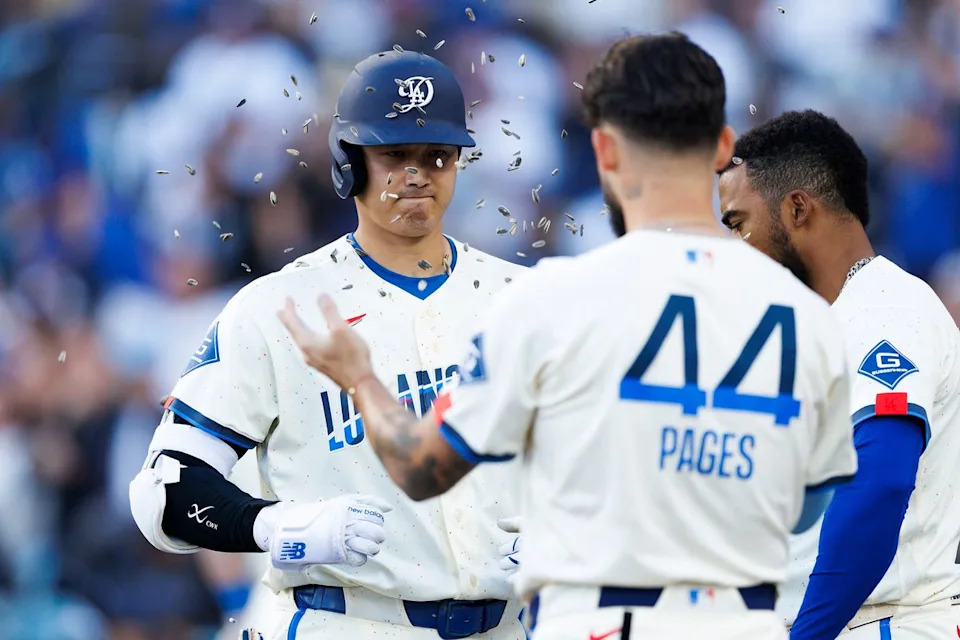 Shohei Ohtani #17 of the Los Angeles Dodgers celebrates his home run with Andy Pages #44 of the Los Angeles Dodgers during the game against the Texas Rangers at Dodger Stadium on April 11, 2026 in Los Angeles, California. 