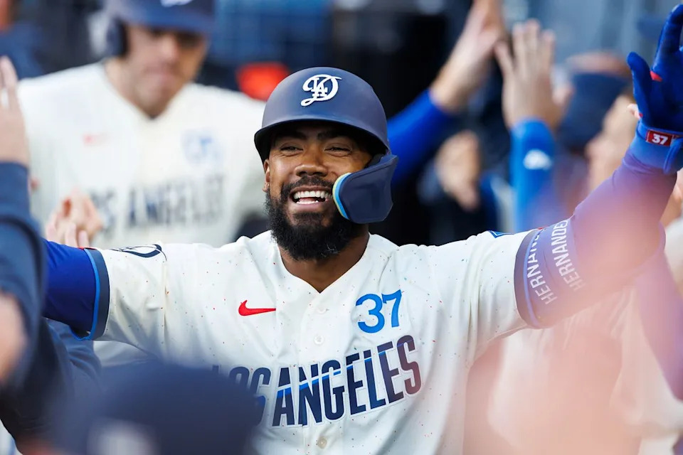 Teoscar Hernandez #37 of the Los Angeles Dodgers celebrates his home run in the dugout during the game against the Texas Rangers at Dodger Stadium on April 11, 2026 in Los Angeles, California.