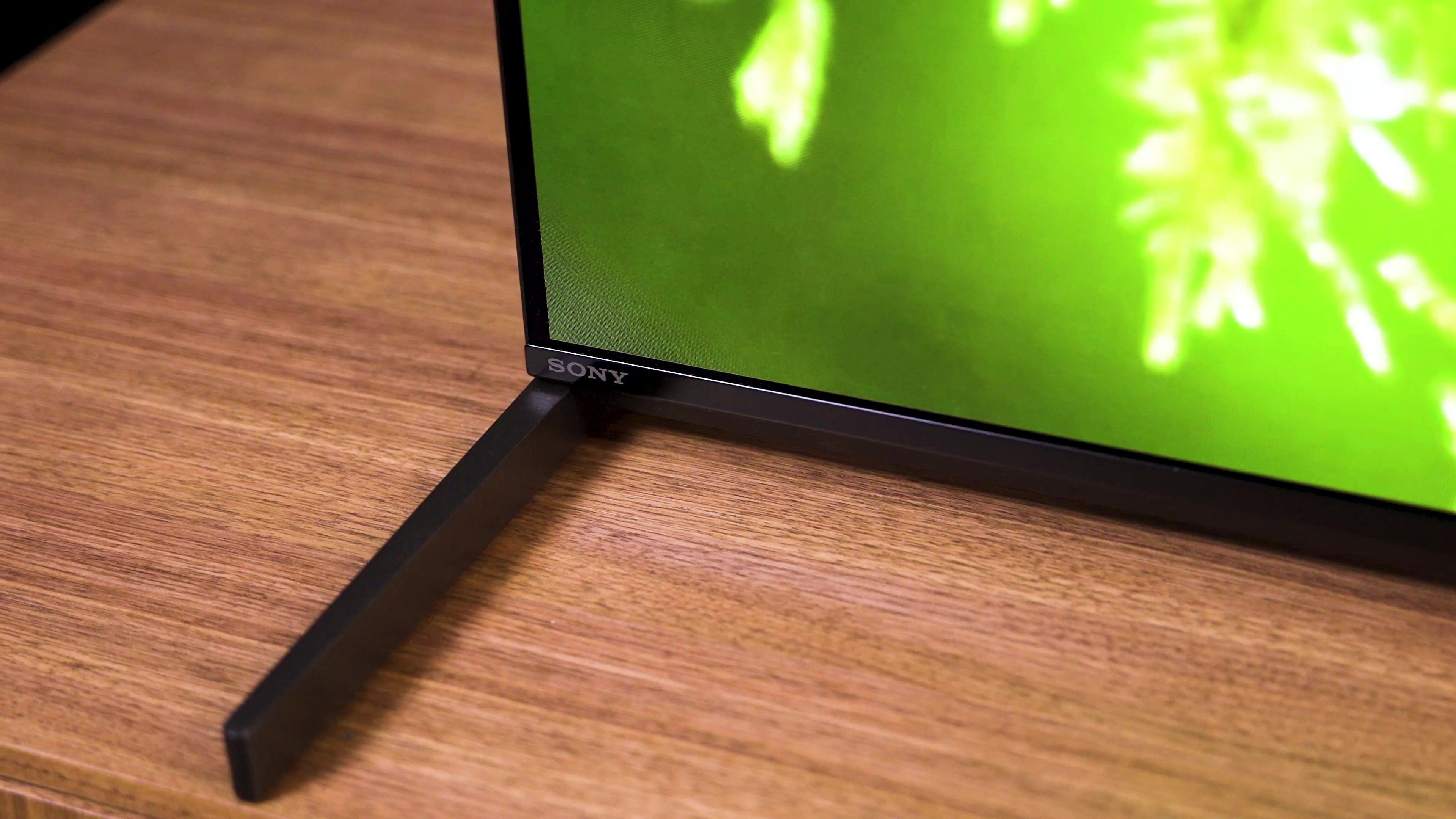 The foot and bottom corner of a Sony A95L QD-OLED TV.