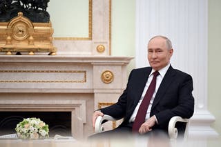 Russia’s president Vladimir Putin attends a meeting at the Kremlin in Moscow