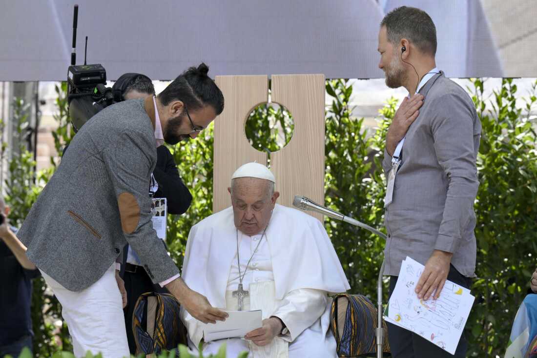 Pope Francis greets Maoz Inon and Aziz Sarah, two entrepreneurs from Israel and Palestine respectively, from whom the war has torn away their family members, during the meeting ‘Arena of Peace’ at the Verona's Arena on May 18, 2024 in Verona, Italy. 