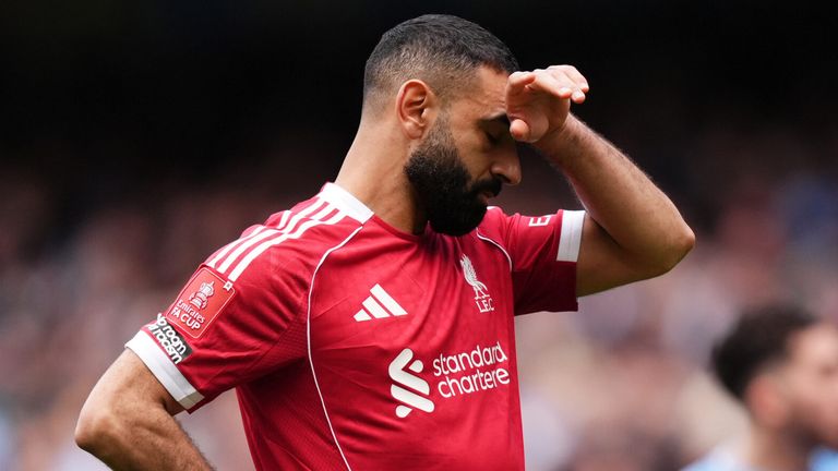 Mohamed Salah reacts after failing to score from the penalty spot against Manchester City