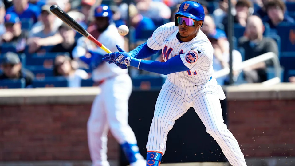 New York Mets second baseman Jorge Polanco (11) hits a bloop single to help the Mets rally going in the first inning, Thursday, March 26, 2026.