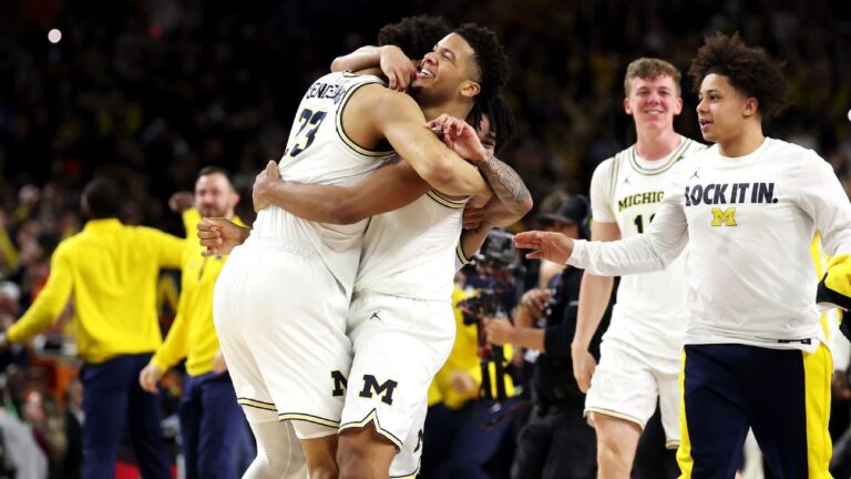 Michigan holds off UConn to win second NCAA hoops title | Latest Sports News