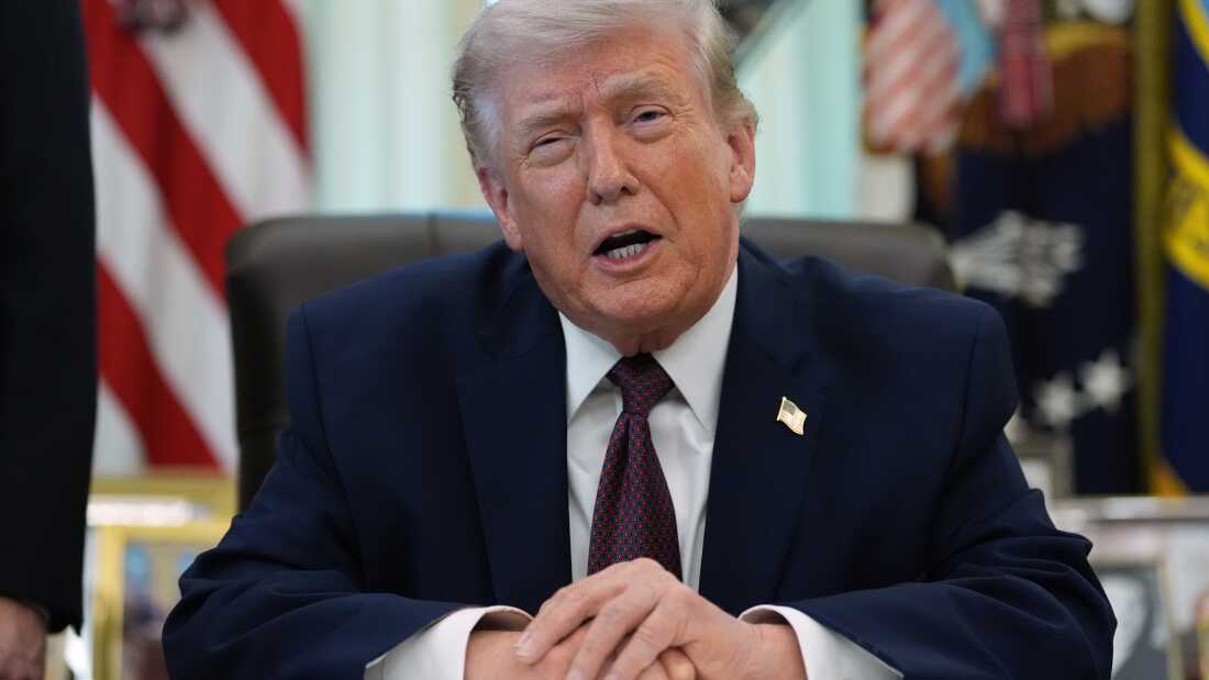 President Donald Trump speaks in the Oval Office of the White House before signing an executive order Tuesday, March 31, 2026, in Washington.