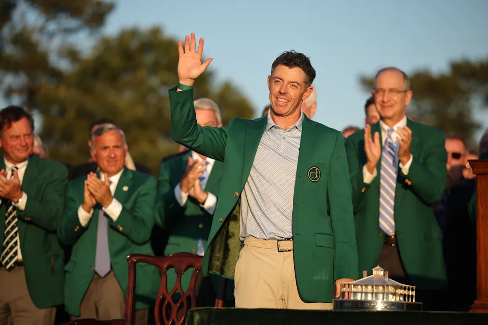 AUGUSTA, GEORGIA - APRIL 12: Rory McIlroy of Northern Ireland reacts after being awarded the Green Jacket during the Green Jacket Ceremony after winning during the final round of the 2026 Masters Tournament at Augusta National Golf Club on April 12, 2026 in Augusta, Georgia. (Photo by Hector Vivas/Getty Images)