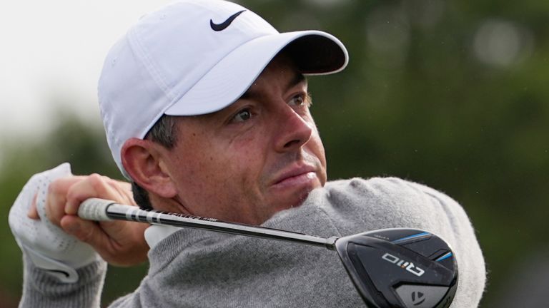 Rory McIlroy, of Northern Ireland, watches his tee shot on the 10th hole during a practice round ahead of  The Masters 